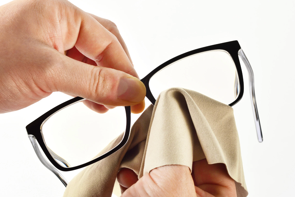 Cleaning eye glasses.