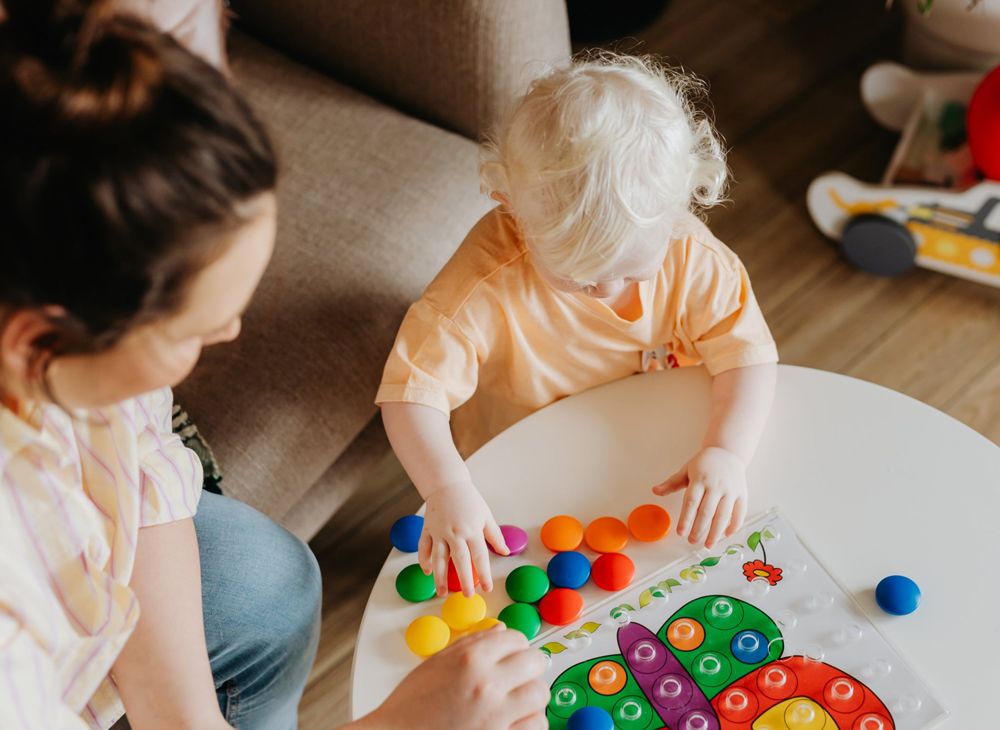 Toy Safety and Eyes l VisionQuest Eyecare Mother playing with child