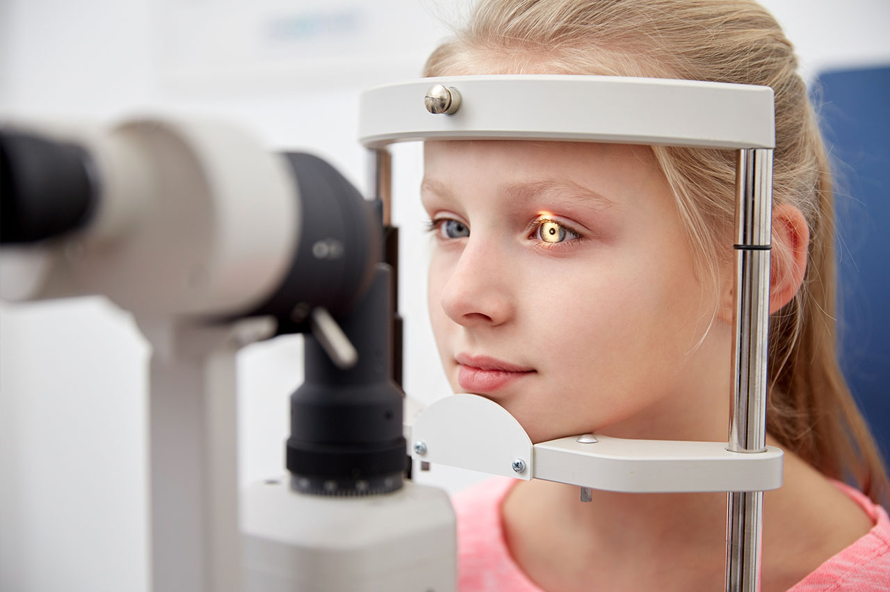 VisionQuest-Eyecare-child-taking-eye-exam