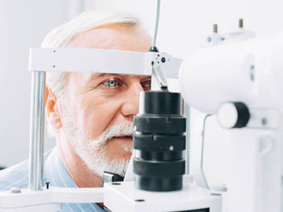 elderly man having eye test at VisionQuest Eyecare