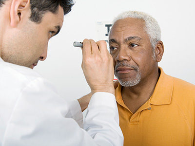 old man with eye doctor at VisionQuest Eyecare