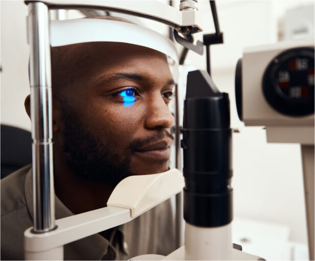 man taking comprehensive eye exam at VisionQuest Eyecare