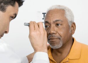 senior taking diabetic eye exam at VisionQuest Eyecare