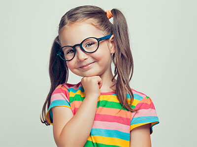 young girl wearing eye glasses at VisionQuest Eyecare