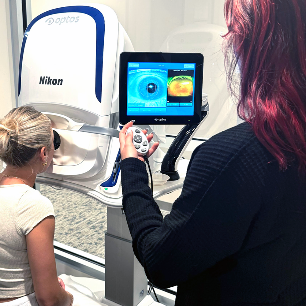 Careers at VisionQuest Eyecare Technician giving eye exam
