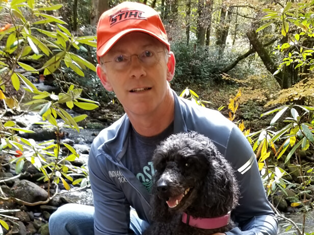 Terry Null, OD with his dog