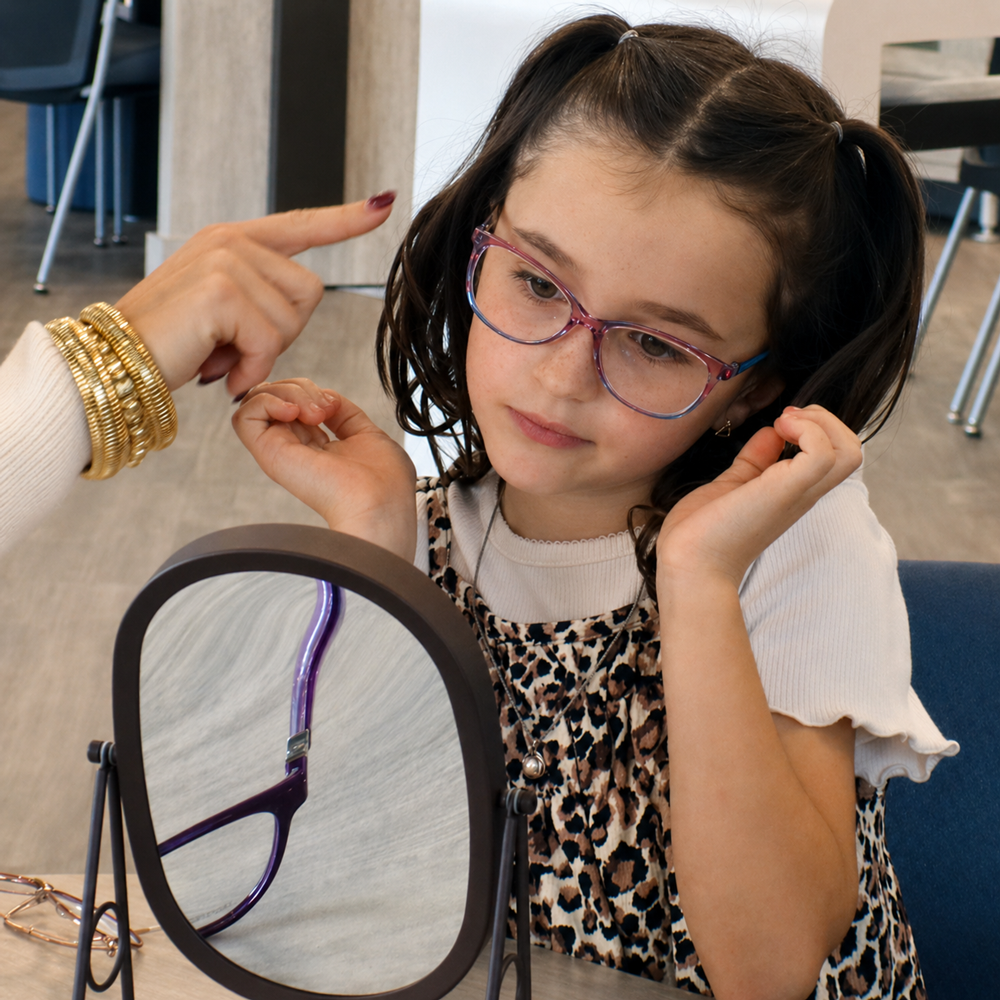 Pick Up New Glasses l VisionQuest Eyecare Indianapolis Girl getting glasses.