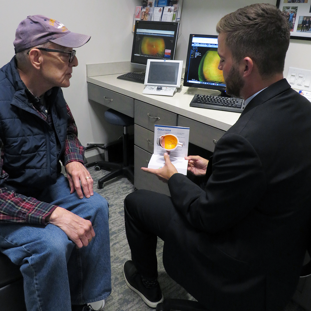 Senior Eye Care l VisionQuest Eyecare Indianapolis Senior taking to an eye doctor