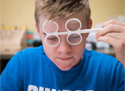 boy take vision therapy at VisionQuest Eyecare