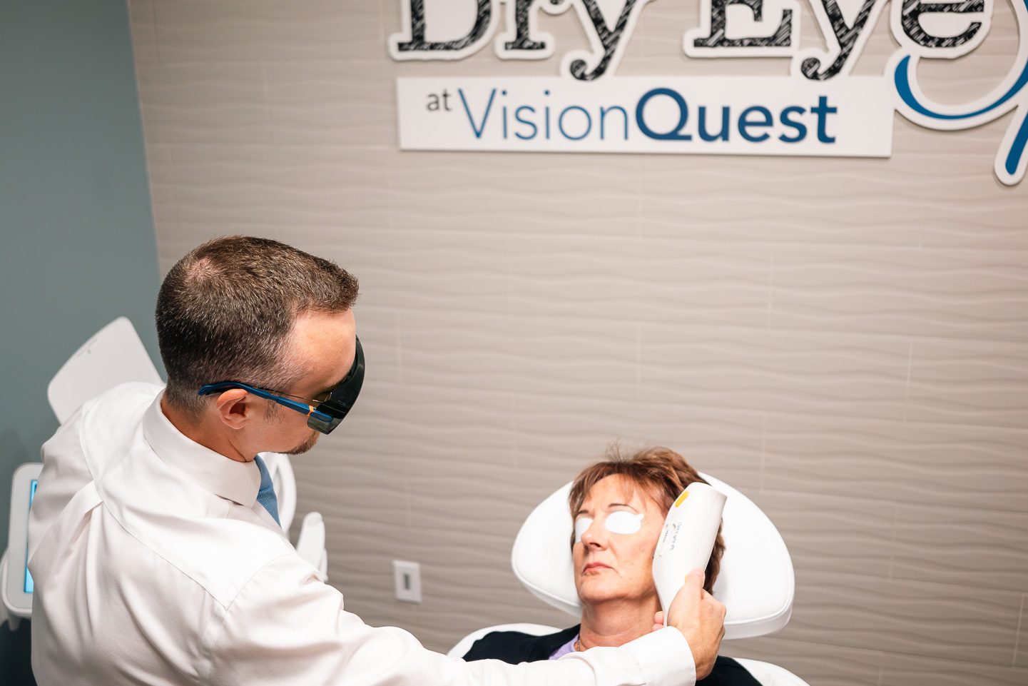 Dr. Rush helping a patient with dry eye treatment