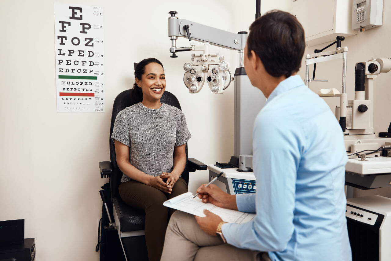 woman happy with her eye exam at VisionQuest Eyecare